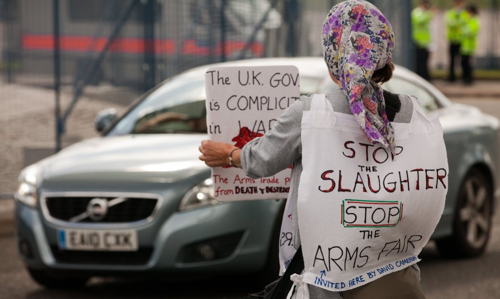 An anti-arms trade campaigner outside the DSEI fair in London.