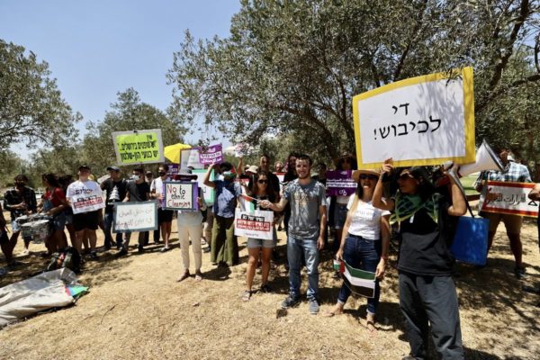 Palestinians stage a protest in front of the Supreme Court of Israel after the court's postponed its decision on the objection of the Palestinian families on forced eviction in Sheikh Jarrah on 2 August 2021