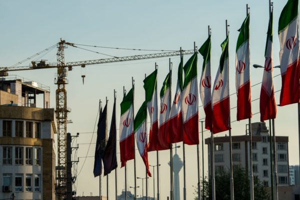National flags of Iran line a section of the Hashemi Rafsanjani highway