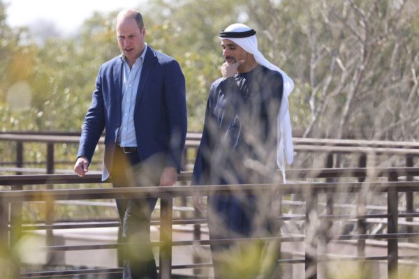 Britain's Prince William speaks with Chairman of Abu Dhabi Executive Office Sheikh Khalid bin Mohammed bin Zayed al-Nahyan as he visits wetlands at the Jubail Mangrove Park, in Abu Dhabi, United Arab Emirates, February 10, 2022. Ian Vogler/Pool via REUTERS
