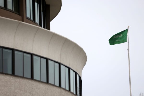 The flag of Saudi Arabia flies above the Saudi Arabian embassy near the Watergate complex in Washington, US, February 26, 2021