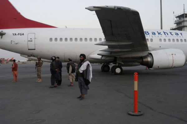 Members of the Taliban stand on the runway of the international airport in Kabul, Afghanistan, September 9, 2021. WANA (West Asia News Agency)